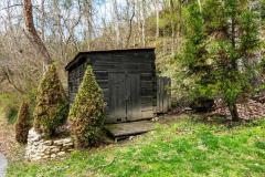 Separate shed is much larger than it looks. Excellent storage!.