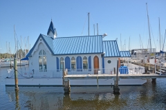 Former floating chapel converted to luxury houseboat for sale.