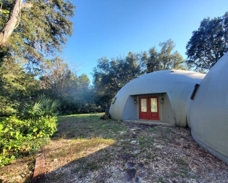 Red Entry Doors of the Monolithic Dome Home for Sale