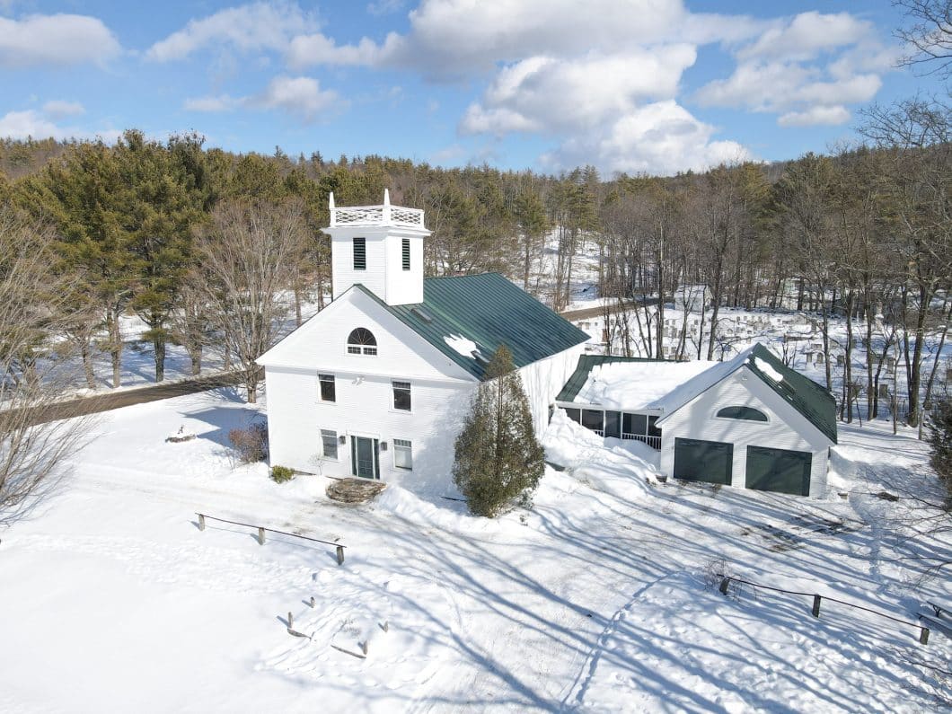 Aerial view of Historic Church Conversion on a country road