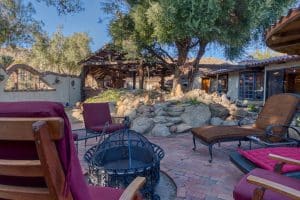 inviting courtyard at rear of Unique yucca valley home