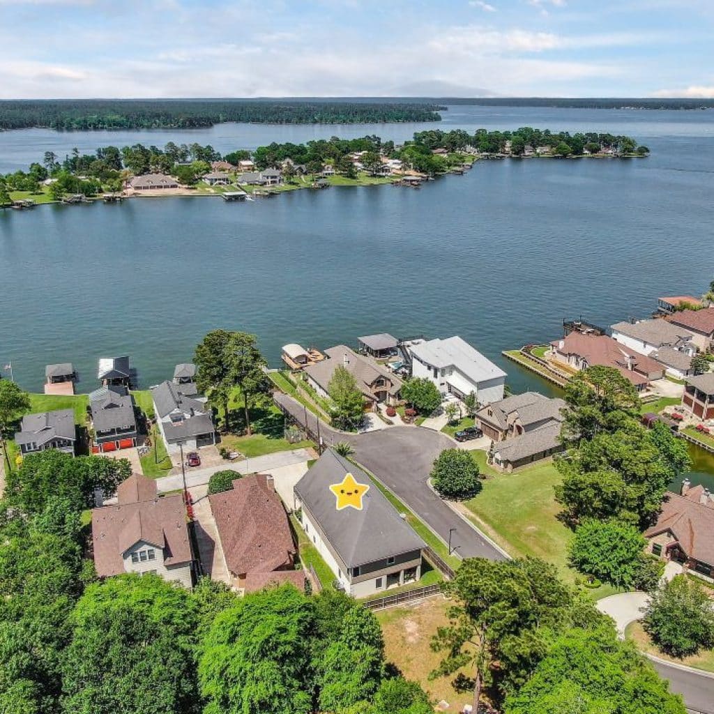 Aerial shot of a home with Lake Conroe Water Views!