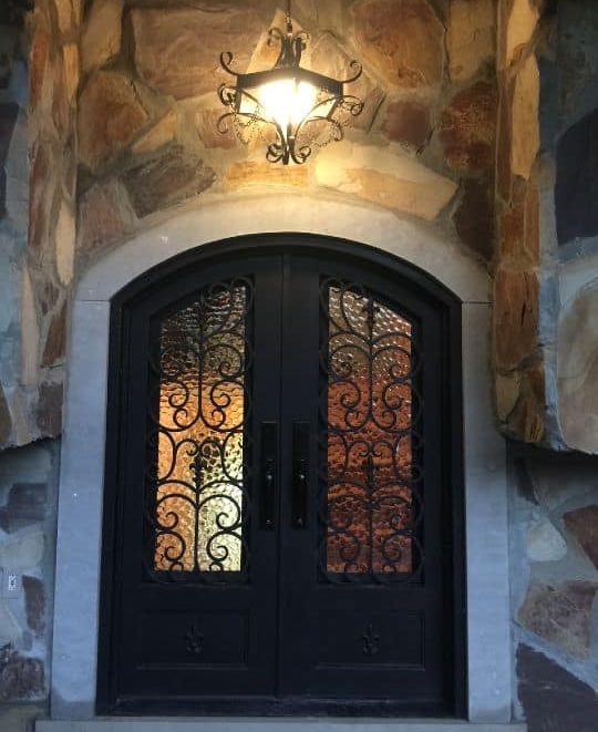 Iron Entry doors to the Contemporary Multi-Generational House