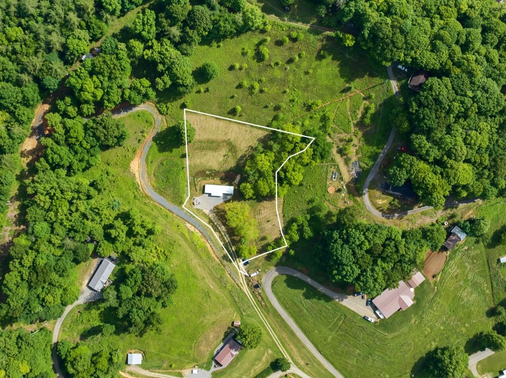 aerial view of modern rustic bermed home.