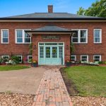 Exterior of historic schoolhouse transformed into great house.