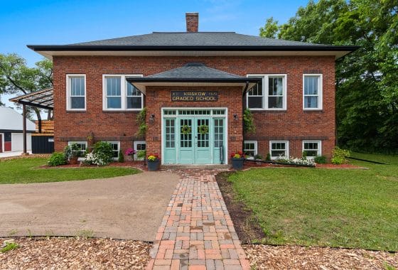 Exterior of historic schoolhouse transformed into great house.