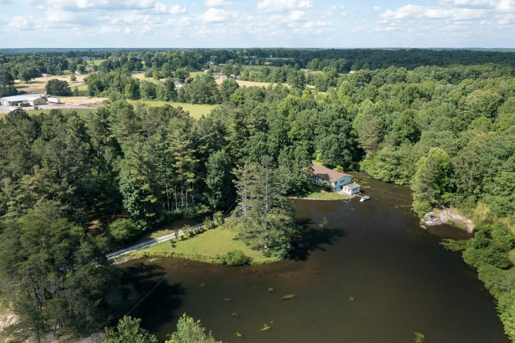 Aerial view of the pond at the prepper's waterfront paradise.