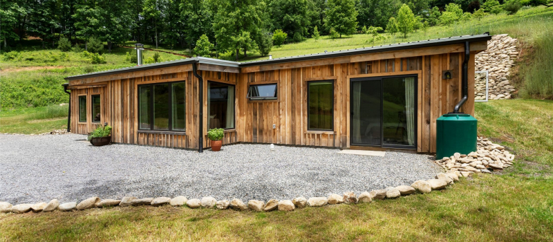 Daylight view of the modern rustic passive solar home.