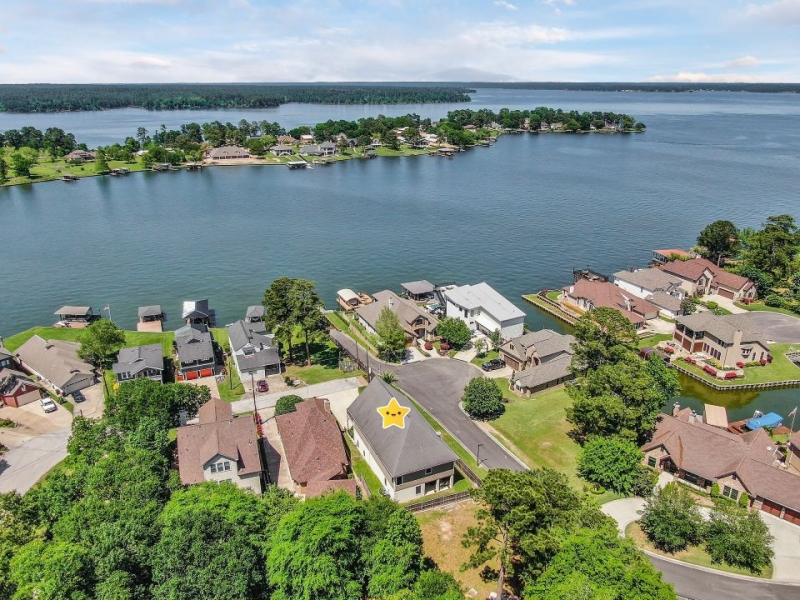Aerial shot of a home with Lake Conroe Water Views!