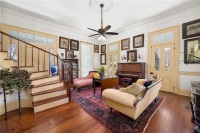 2025-Jul-16-Ruth-May-Sitting-Room-Behind-Kitchen-With-Staircase